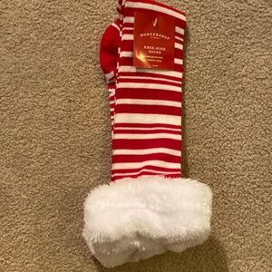 Red and White Striped Knee Highs one size fits most socks🧑🏻‍🎄.